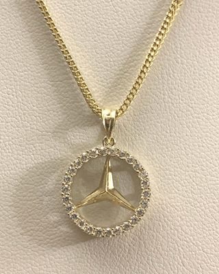 Benz pendant with 1.5mm Franco chain 10k gold /cz. Available online.
www.devonjewels.com